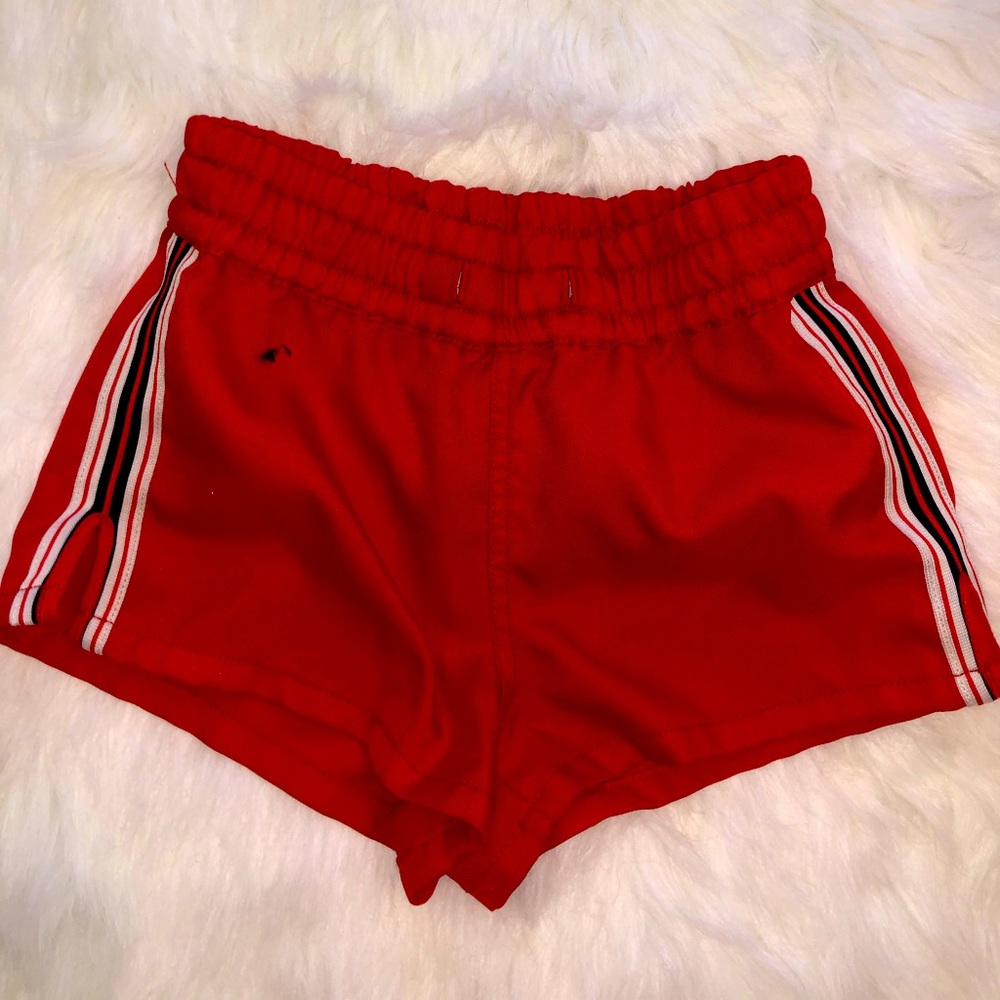 SPORTY SPICE VIBES TNA BEACH SHORTS